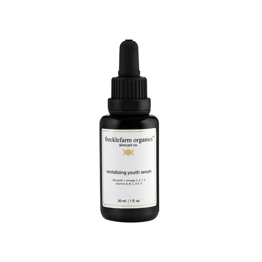 Lightweight organic gold serum texture — vegan cruelty-free youth  skincare